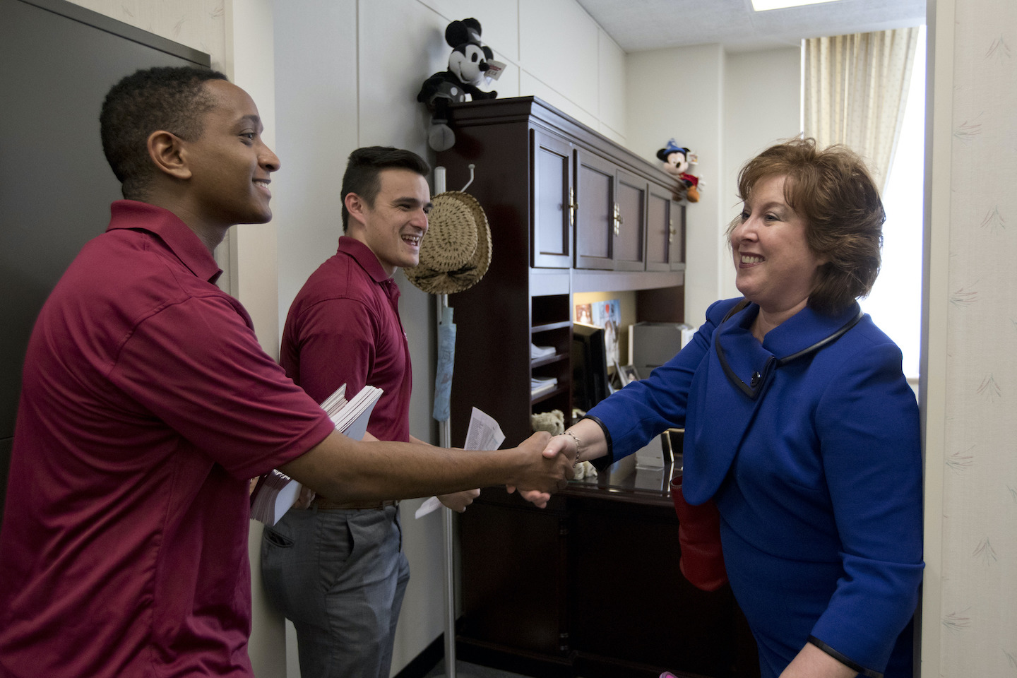 image of UG students meeting a congresswoman in her office