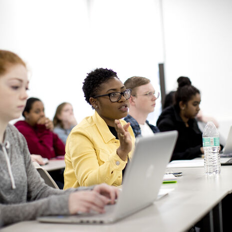 Students using computers in a classroom 