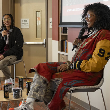 A photo of author Nic Stone speaking on Temple's campus.