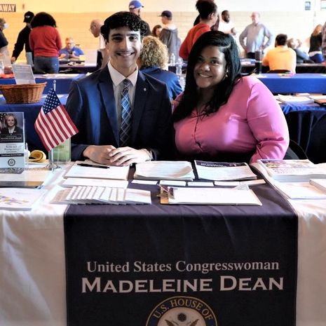 Andrew Green and Congresswoman Madeleine Dean sitting at a table