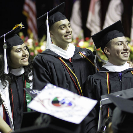 image of CLA students in their graduation caps and gowns