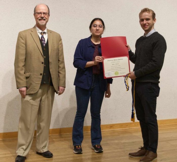 Professor Diamantaras and ODE President Zainab Malik with new initiate Ethan Walters