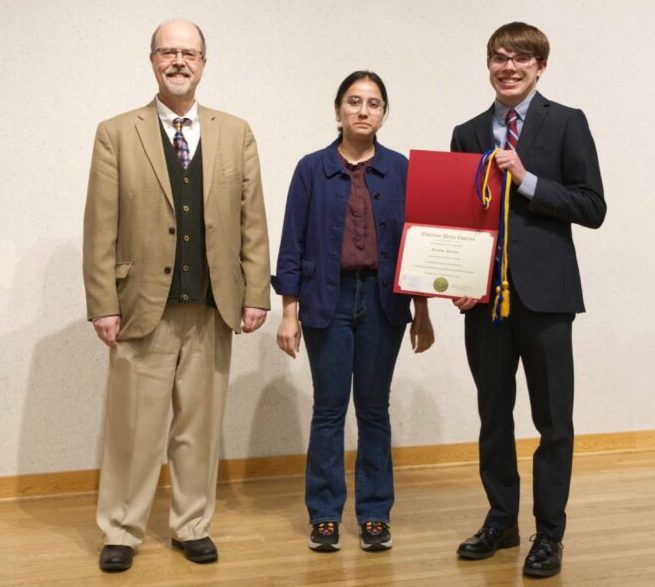 Professor Diamantaras and ODE President Zainab Malik with new initiate Matthew Drayton