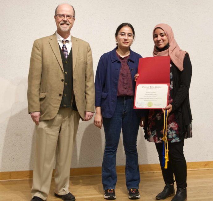 Professor Diamantaras and ODE President Zainab Malik with new initiate Sameen Farooki