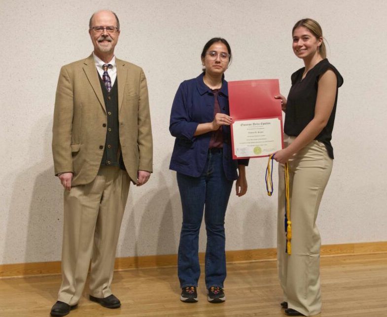 Professor Diamantaras and ODE President Zainab Malik with new initiate Victoria Szyper