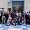 image of CJ students and faculty standing and sitting outside in a group photo