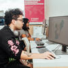 image of students working on mapping software at their computers