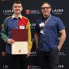 image of faculty member and student at LAURA awards