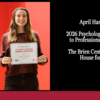 image of April holding a certificate