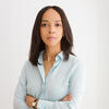 Marcella Aline Toledo with her arms crossed staring into the camera