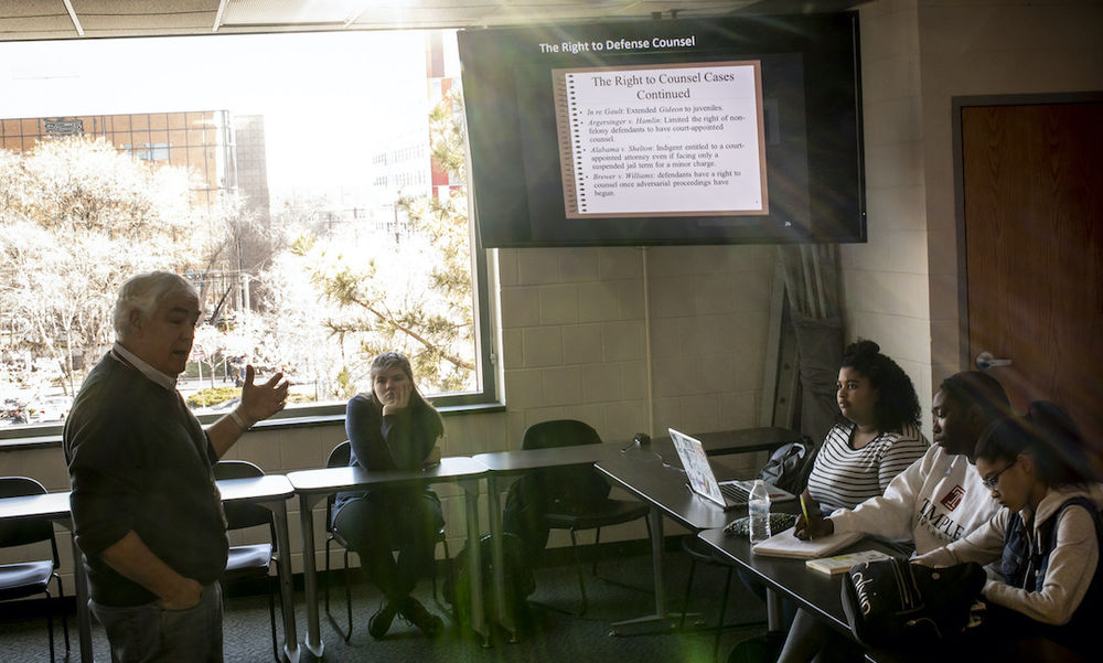 image of Professor Peter Jones teaching Honors class