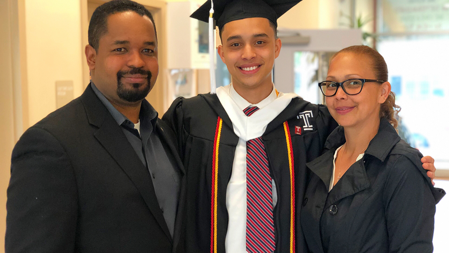 Angel Betancourt, CLA '19, in cap and gown