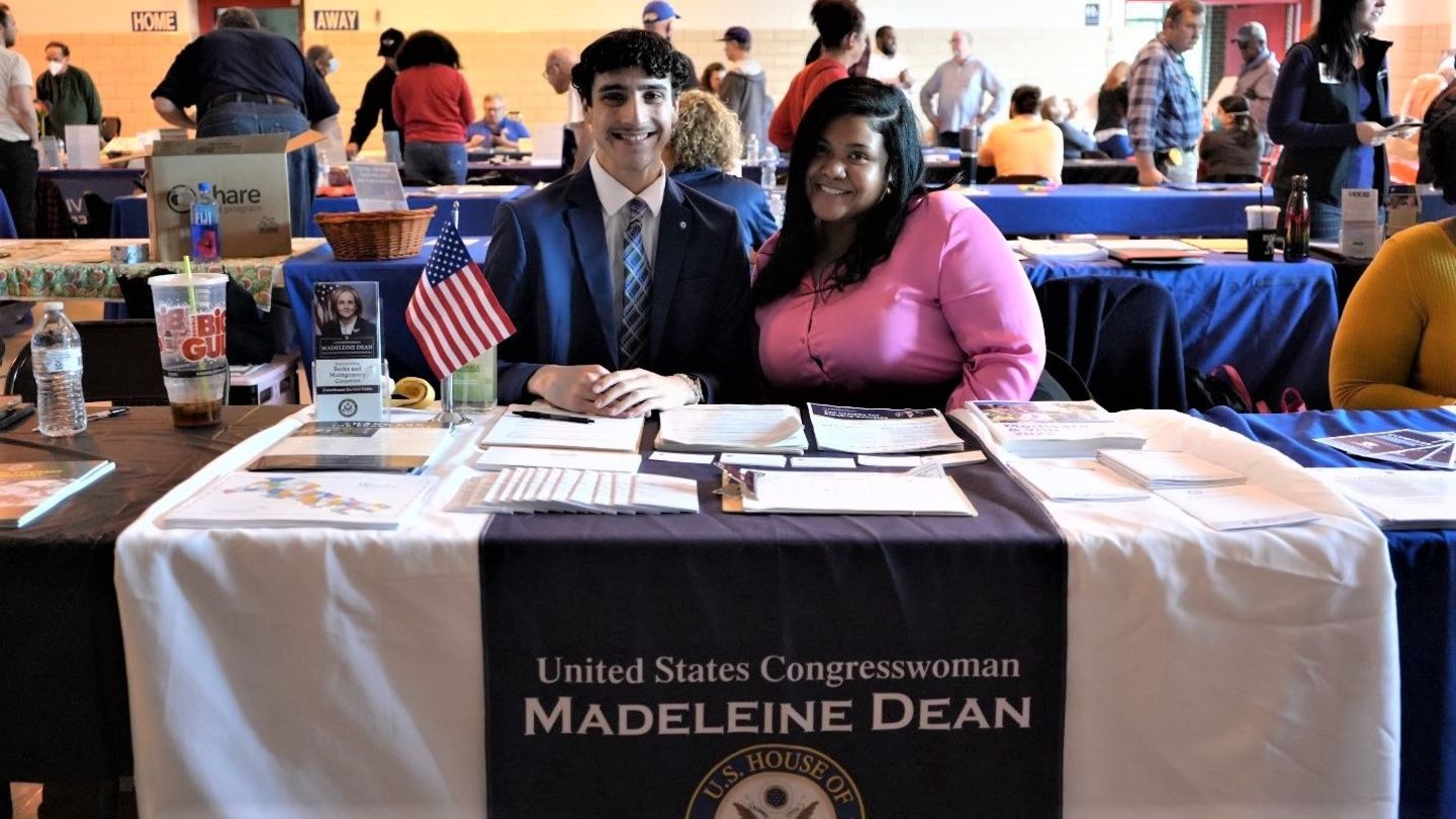 Andrew Green and Congresswoman Madeleine Dean sitting at a table