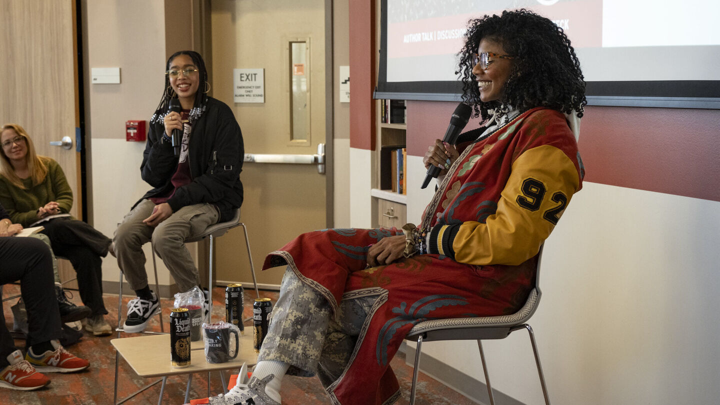 New York Times bestselling author Nic Stone, pictured at right, recently visited Temple's where she spoke to nearly 100 area high school students. A photo of author Nic Stone speaking on Temple's campus.