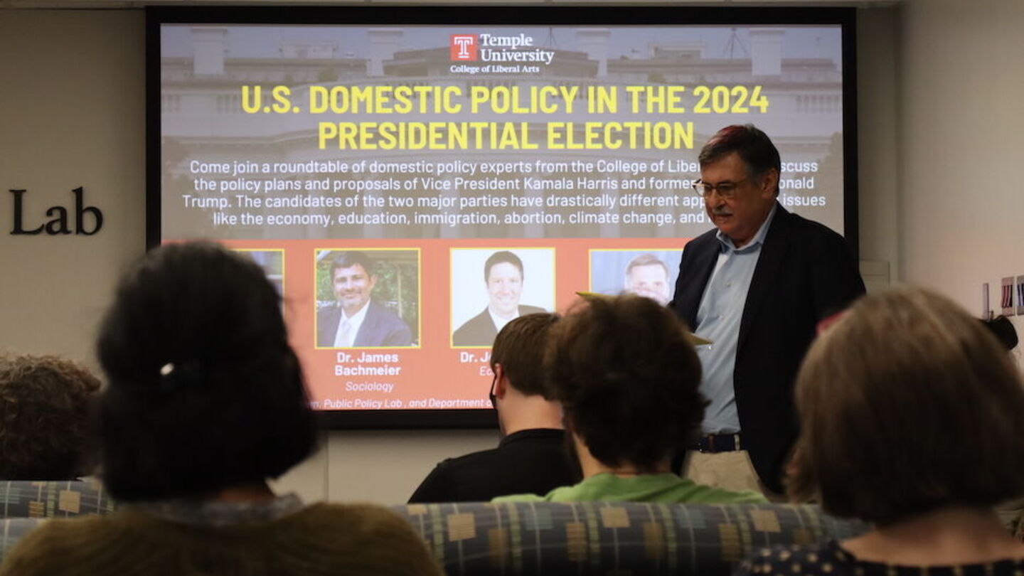 image of Gary speaking to a crowd at the Public Policy Lab